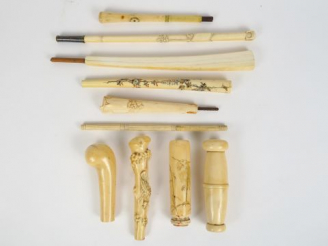 Vente aux enchères 10 manches d'ombrelle en ivoire sculptée