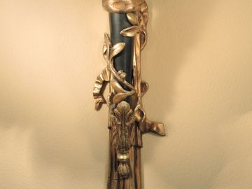 Suite de quatre appliques doubles de style Louis XVI en bronze doré, à