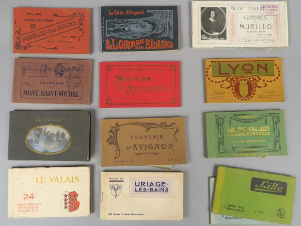 8 albums de cartes postales et un album de gravures