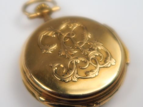Montre de gousset en or, à décor d'un monogramme. Poids 24,3 g