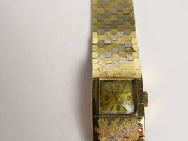 EXACTUS. Montre de dame, boitier et bracelet en or. Poids tel : 36,6 g