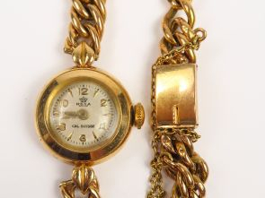 Montre de dame, bracelet et cadran en or. Poids tel : 13,9 g