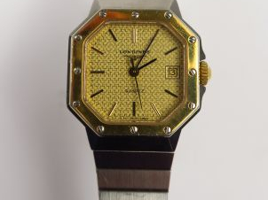 LONGINES. Montre de dame en acier, cadran octogonal