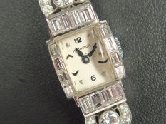 HAMILTON. Montre de dame Art Déco en or 14 carats, boitier et bracelet