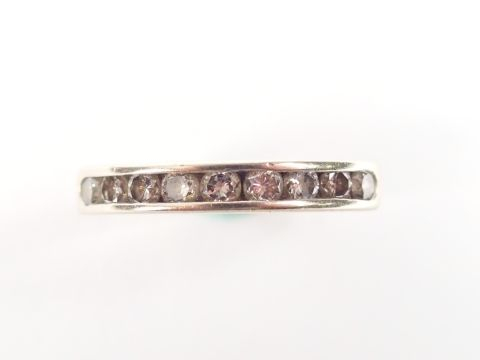 Demi-alliance américaine monture or blanc, ornée de 9 diamants taille 