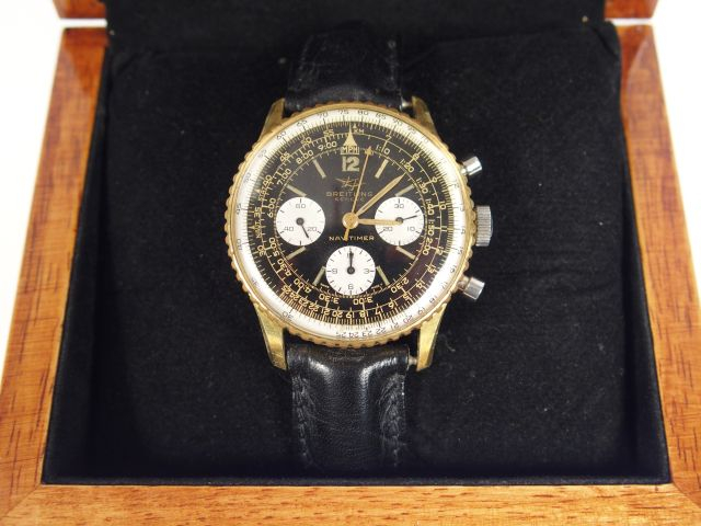 BREITLING, "Navitimer". Montre d'homme, boitier acier plaqué or, brace