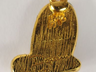 DAUM France. Pendentif "Cactus" en pâte de verre et plaqué or.