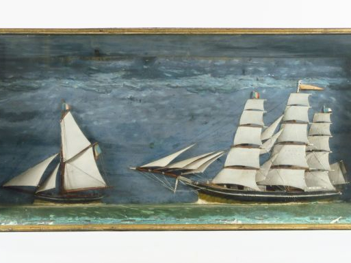 Diorama avec deux bateaux à voiles.