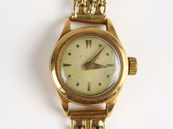 Montre bracelet en or. Poids tel : 28,3 g