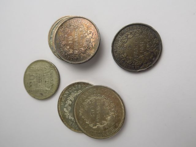 Ensemble de pièces d'argent comprenant 2 pièces de 50 F, 1 pièce de 20