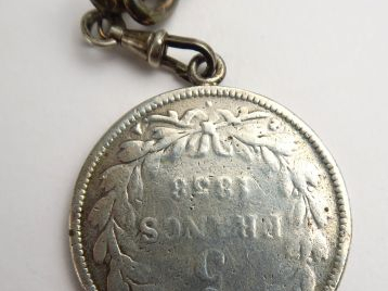 Pièce de 5 francs en argent, montée en pendentif, avec sa chaine. Poid