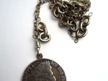 Pièce de 5 francs en argent, montée en pendentif, avec sa chaine. Poid