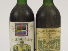 Vente aux enchères 2 BOUTEILLES : 1 CHÂTEAU SIRAN CB MARGAUX 1983 BG - 1 CHÂTEAU CARBONNI