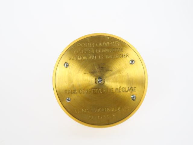 Pendule cage 1900 en laiton et cristal, modèle "400 jours".  H. 30cm
