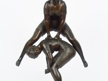 RANCOULET. "A Trouville" Sculpture en bronze à patine brune. Signée. H