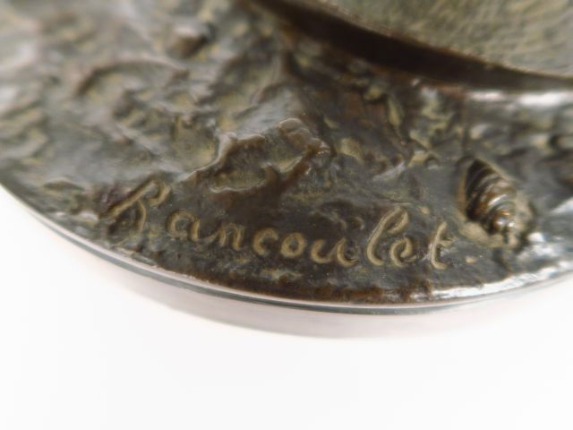 RANCOULET. "A Trouville" Sculpture en bronze à patine brune. Signée. H