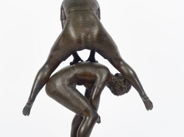 RANCOULET. "A Trouville" Sculpture en bronze à patine brune. Signée. H