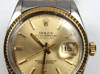 ROLEX. Montre d'homme, en métal, modèle Oyster Perpetual, (cadran rayé
