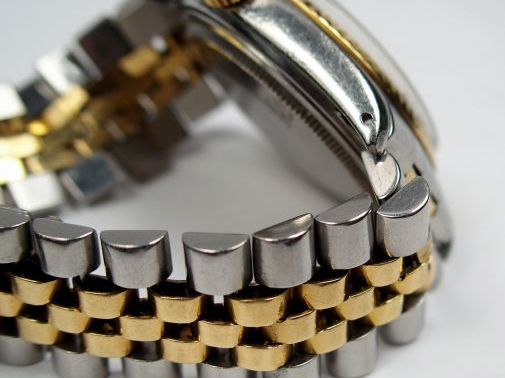 ROLEX. Montre d'homme, en métal, modèle Oyster Perpetual, (cadran rayé