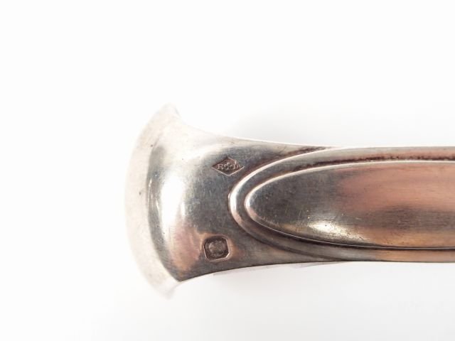 Paire de pinces à sucre Art Déco en argent, poinçon Minerve. MO : Ravi