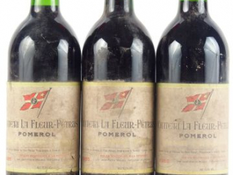 Vente aux enchères 3 BOUTEILLES CHÂTEAU LA FLEUR PETRUS POMEROL - 1985 - E POUSSIEREUSES