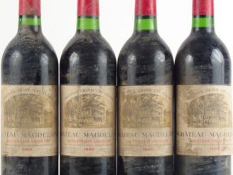 Vente aux enchères 4 BOUTEILLES CHÂTEAU LA MAGDELAINE 1er GCC ST EMILION - 1985 - E POUSS