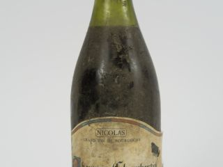 Vente aux enchères 1 BOUTEILLE CHARMES CHAMBERTIN NICOLAS - 5 CM/ELS/PRESUMEE 1961