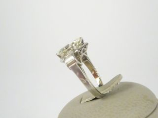 Brillant de 4,87 cts environ, couleur : M - Pureté : VS2, taille : bon