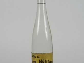 Vente aux enchères 1 BOUTEILLE EAU DE VIE DE POIRE WILLIAMS KURHI 45°