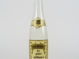 Vente aux enchères 1 BOUTEILLE EAU DE VIE DE POIRE WILLIAMS J. DELPONT 42°
