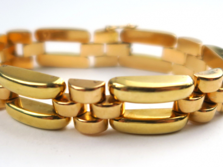  Bracelet tank en or deux tons. Poids  : 38,74 g ac