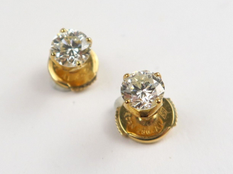Vente aux enchères Puces d'oreilles serties de diamants de 0,30 carat environ