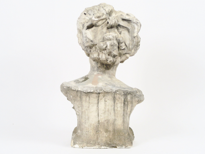 J.M BOUTARY "Jeune femme au chignon" Buste en plâtre.  Signé et daté m