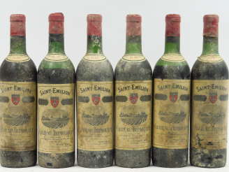 Vente aux enchères 6 BOUTEILLES CHÂTEAU TRIMOULET GCC ST EMILION - 1959 - 1 BG/2 HEP/1 ME