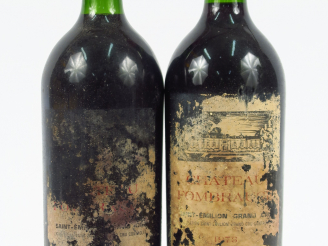 Vente aux enchères 2 MAGNUMS CHÂTEAU FOMBRAUGE GC ST EMILION - 1976 - 1 BG+/EA/1 PRESUMEE