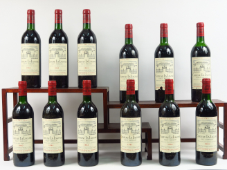 Vente aux enchères 12 BOUTEILLES CHÂTEAU LA LAGUNE GCC HAUT MEDOC - 1985 - CBO - 4 BG/5 L