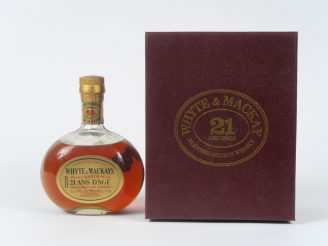 Vente aux enchères 1 BOUTEILLE WHYTE AND MACKAYS (75 cl) - 43° - Age : 21 ans - Mise anné