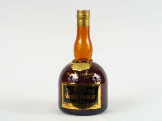 Vente aux enchères 1 BOUTEILLE GRAND MARNIER 'CUVEE DU CENTENAIRE 1827 - 1927'
