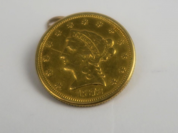 1 pièce de 2,5 dollars en or. Chainette soudée. Poids : 4,5 g