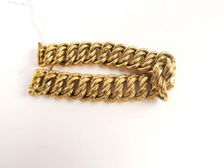 Bracelet maille américaine en or. Poids : 33 g