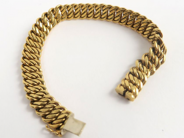 Gourmette en or, maille américaine. Poids 18,7 g