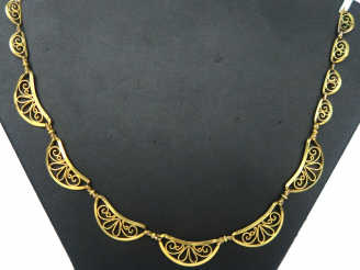 Vente aux enchères Collier draperie en or. Poids : 9,9 g
