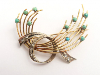 Vente aux enchères Broche en or, ornée de turquoises et pierres d'imitation. Poids tel : 