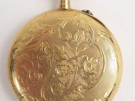 Montre de gousset en or, à décor de rinceaux. Poids tel : 62 g