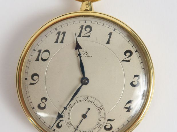 ELECTION. Montre en or . Poids tel : 58 g