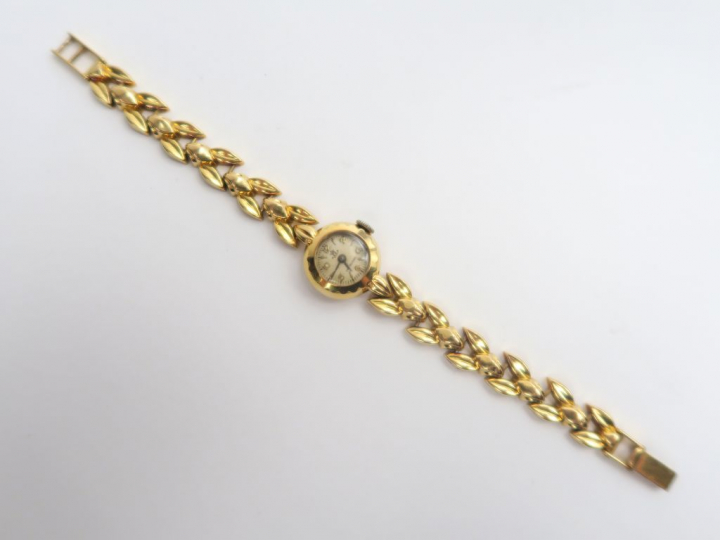 Montre bracelet en or. Poids tel : 25,4 g