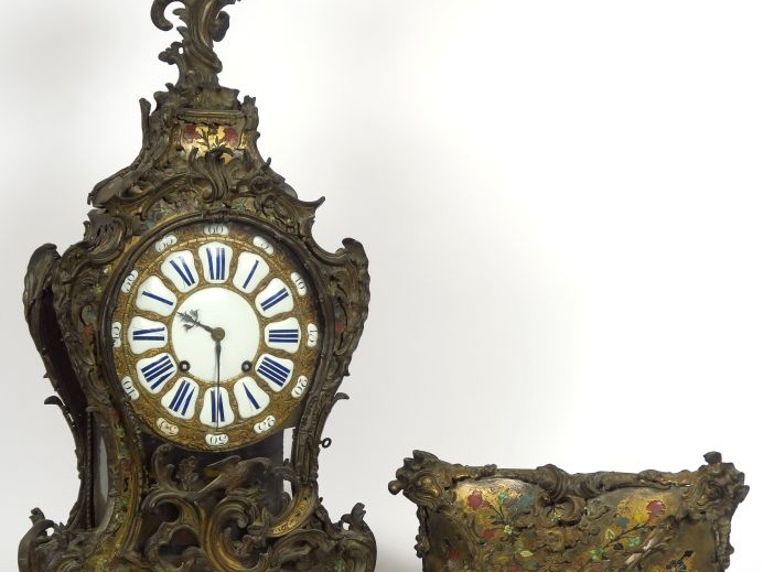 Cartel rocaille en marqueterie Boulle, ivoire teinté et nacre, très ri