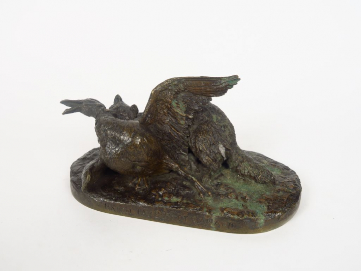 P.J. MENE. "Raton laveur et canard". Groupe en bronze à patine brune. 