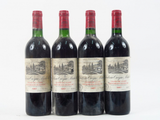Vente aux enchères 4 BOUTEILLES CHÂTEAU CROQUE MICHOTTE GCC ST EMILION - 1987 - 2 BG+/2 B