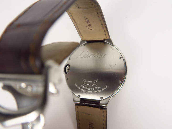 CARTIER.  Montre d'homme, modèle Ballon bleu, bracelet en cuir.